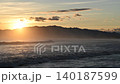 After the typhoon passed, huge waves crashed onto the Shonan coast in the evening light. 140187599