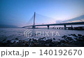 Danjiang Bridge at Sunset in New Taipei City, Taiwan 140192670
