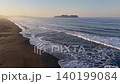 An aerial photograph of Tsujido Beach in the early morning. 140199084