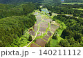 The landscape of terraced rice paddies stretching deep into the mountains is a quintessential Japanese scene. 140211112