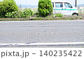 Trucks and cars driving on a national highway; cars; trucks; national highway; traffic; transport; movement; carrying; driving; business; road 140235422