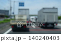 Transport trucks traveling on a national highway; transport; land transport; transportation; truck; national highway; heatwave; long distance; logistics. 140240403
