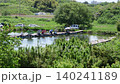 A bustling local fishing pond; fishing pond; fishing; crucian carp; leisure; seniors; family; couples; friends; fishing; sunny weather 140241189