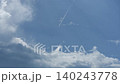 White and Grey Clouds Drifting Across Bright Blue Tropical Sky on Sunny Day 140243778
