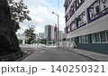 May 24 2026  , sloping urban hillside street features local residential mid-rises and community facilities nestled in the Ping Shan area. 140250321