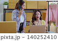 Two asian woman e-commerce startup in home office, two young entrepreneur management order. 140252410