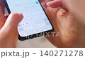 Female hands typing text on smartphone close-up. 140271278