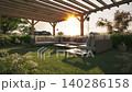 Cozy evening at home in the backyard. Backyard terrace at sunset. Backyard patio with outdoor furniture 140286158