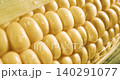 Close-up of fresh ear of corn with dewy kernels and partial husk 140291077