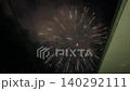 Close-up Of Colorful Fireworks Exploding In Night Sky From Residential View 140292111