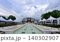 Sofia, Bulgaria - 06.06.2026. Wide panoramic view of fountains in front of the National Palace of Culture NDK, central square in summer daylight. Blue sky with white clouds, clear water, iconic urban 140302907