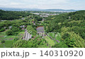 Aerial drone view overlooking rural farmland, bamboo groves, forests and residential areas in Kuno, Odawara, Kanagawa, Japan. 140310920