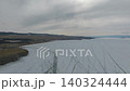 Aerial winter view of Khuzhir village on Olkhon Island, Lake Baikal shoreline 140324444