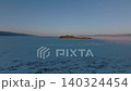 Aerial winter view of Olkhon Island and frozen Lake Baikal at sunset 140324454