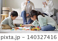 A family holiday spent playing in the living room 140327416