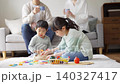 A family holiday spent playing in the living room 140327417