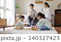 A family holiday spent playing in the living room 140327423