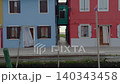 Quiet Colorful Venetian Canal Street With Wooden Dock 140343458