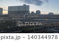 Express trains and commuter trains arriving at and departing from Shin-Osaka Station at dusk: Kinki region's transportation infrastructure 140344978