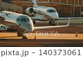 Private jets park at busy airport during sunset over the runway in clear sky 140373061