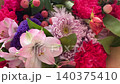 Smooth Camera Pan Over Mixed Pink Flower Bouquet with Carnations 4K Footage 140375410