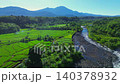 Beautiful morning view in Indonesia, panoramic landscape of rice fields with mountain ranges and clear sky 140378932