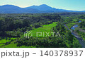 Beautiful morning view in Indonesia, panoramic landscape of rice fields with mountain ranges and clear sky 140378937