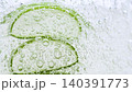Serum gel texture with aloe vera leaf and bubbles, transparent cream background 140391773