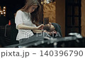 Barber Trimming Client Beard With Scissors 140396790