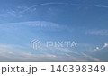 A time-lapse of clouds and contrails spreading across a blue sky: the moment clouds are born from an empty sky. 140398349