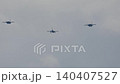 F-35 Lightning II fighter jets conducting aerial maneuvers in the sky 140407527