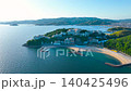 Drone aerial footage (4K) of the Nishiura Onsen and Palm Beach at the tip of the Nishiura Peninsula in Gamagori City, Aichi Prefecture. 140425496