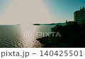Sunset view of Nishiura Onsen and Palm Beach, located at the tip of the Nishiura Peninsula in Gamagori City, Aichi Prefecture. 4K drone footage. 140425501