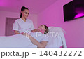 Kinesiology taping face lift treatment in beauty salon 140432272