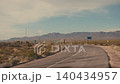 Driving on an empty desert road in the american west 140434957
