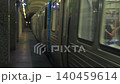 Chicago subway train moving through an underground station platform with motion blur and lights. Urban transit scene capturing speed, movement, and modern transportation system. 140459614