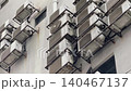Multiple Air Conditioning Units Mounted on Urban Building Wall 140467137