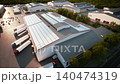 Industrial Warehouse with Fully Installed Rooftop Solar Panels - Sustainable Logistics Center Aerial View 140474319