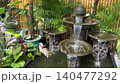 Ornamental garden with waterfall with stones and plants, in a flower nursery. 140477292