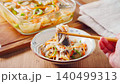 Marinated horse mackerel (Nanban-style), a pre-made dish taken from a storage container. 140499313