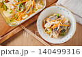 Marinated horse mackerel (Nanban-style), a pre-made dish taken from a storage container. 140499316