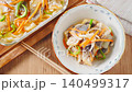 Marinated horse mackerel (Nanban-style), a pre-made dish taken from a storage container. 140499317
