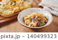 Marinated horse mackerel (Nanban-style), a pre-made dish taken from a storage container. 140499323