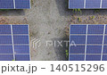 [Aerial Footage] Direct overhead view and ascent of a mega solar power plant (Renewable energy, geometric pattern background material) 140515296