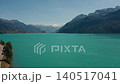 aerial top view drone incredibly colored lake Brienz in Switzerland near mountains  140517041
