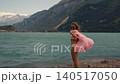 woman long hair in white swimsuit standing on shore Turquoise Azure Water 140517050