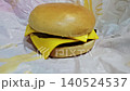 This is a single burger with cheese 140524537