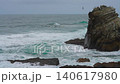 Waves of the East Sea crash against the breakwater and rocky shore, South Korea 140617980