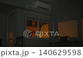 Working air conditioner in night mode in dark room at night during hot weather. Cooling and heating without central heating and ventilation. Comfortable climate in hot countries. 140629598
