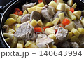 Classic pork and potato stew served as a hearty one-pot comfort meal. 140643994
